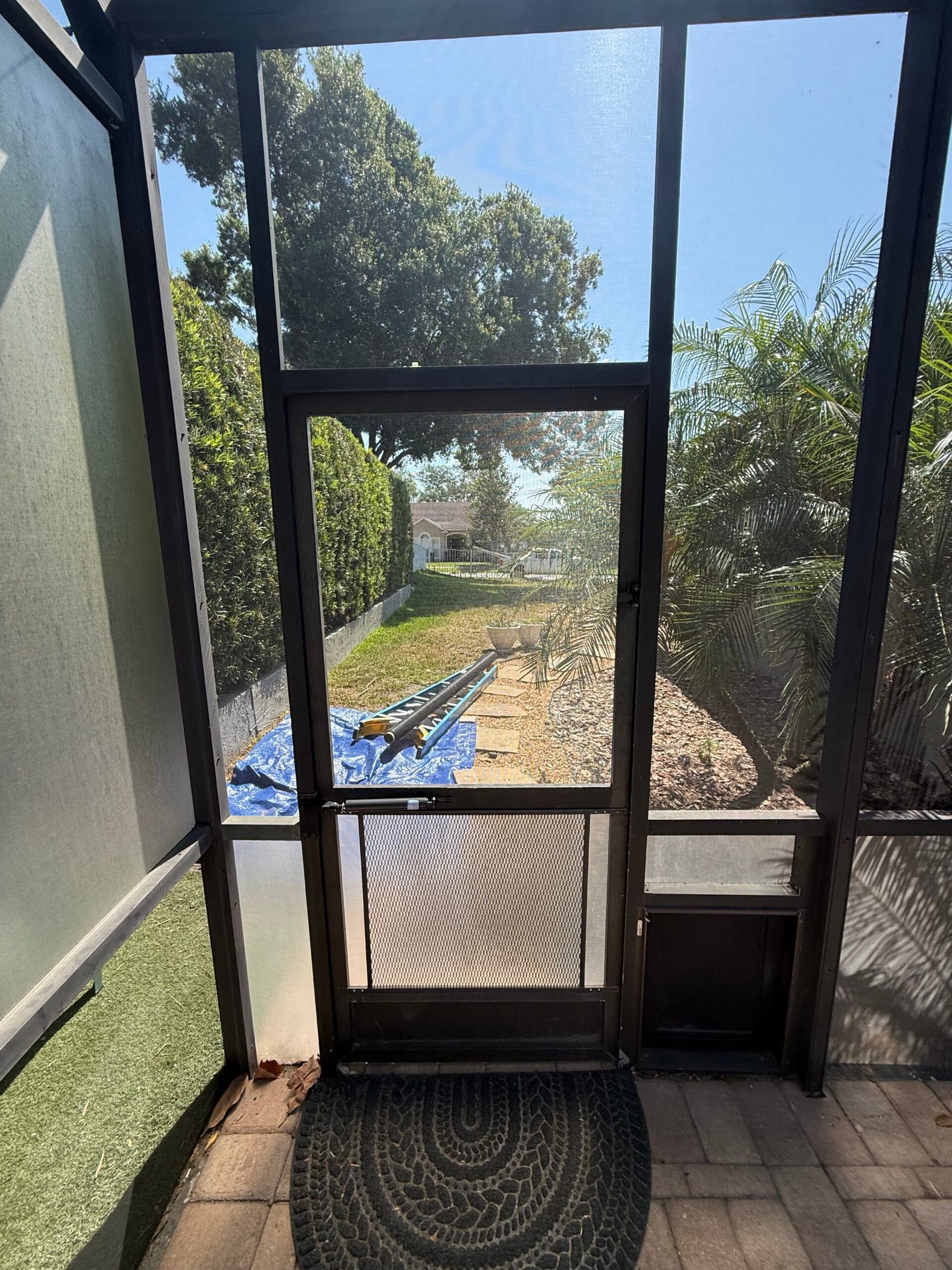 Naples Pool Screen Repair. Pool enclosure roof panel with screen mesh and framing